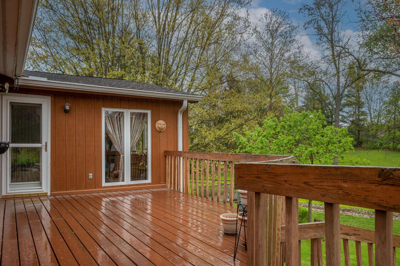 1640 Carriage Road Powell, OH 43065 - Photo 58 of 63 The deck is a great place to enjoy all the beautiful sites in the backyard and listen to the trickling of the creek.