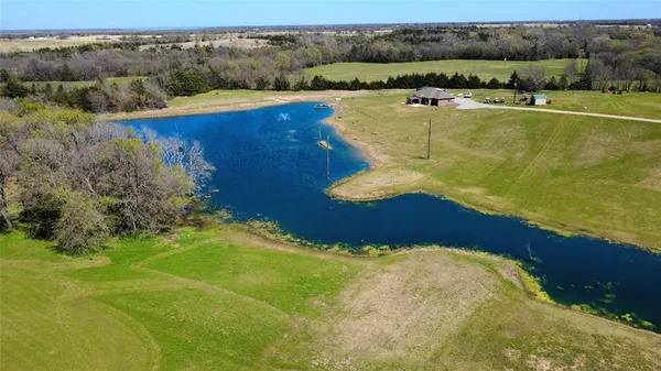 a view of a lake and outdoor space