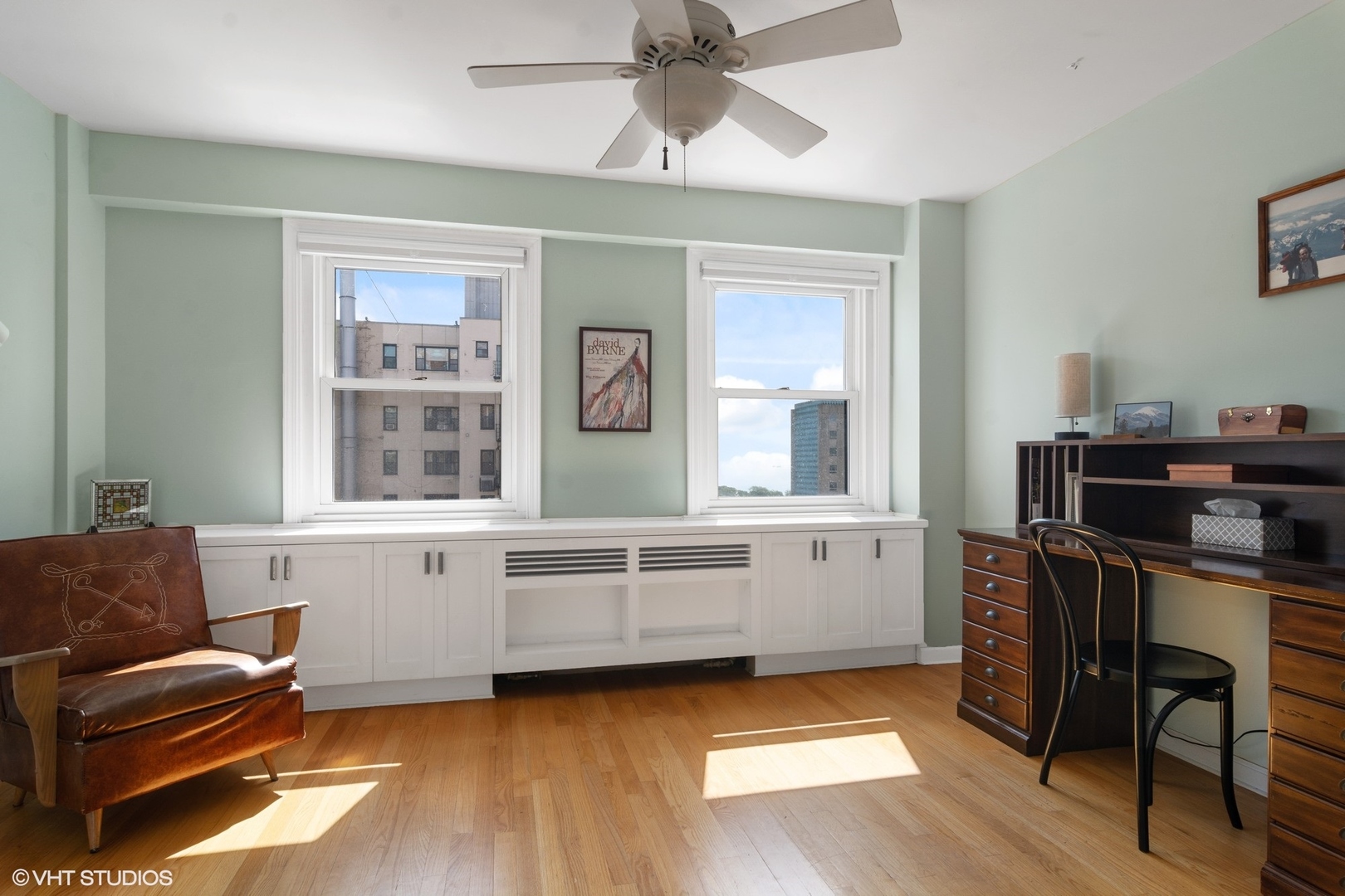2909 North Sheridan Road, Unit 1402 Chicago, IL 60657 - Photo 12 of 15 a kitchen with a refrigerator and windows