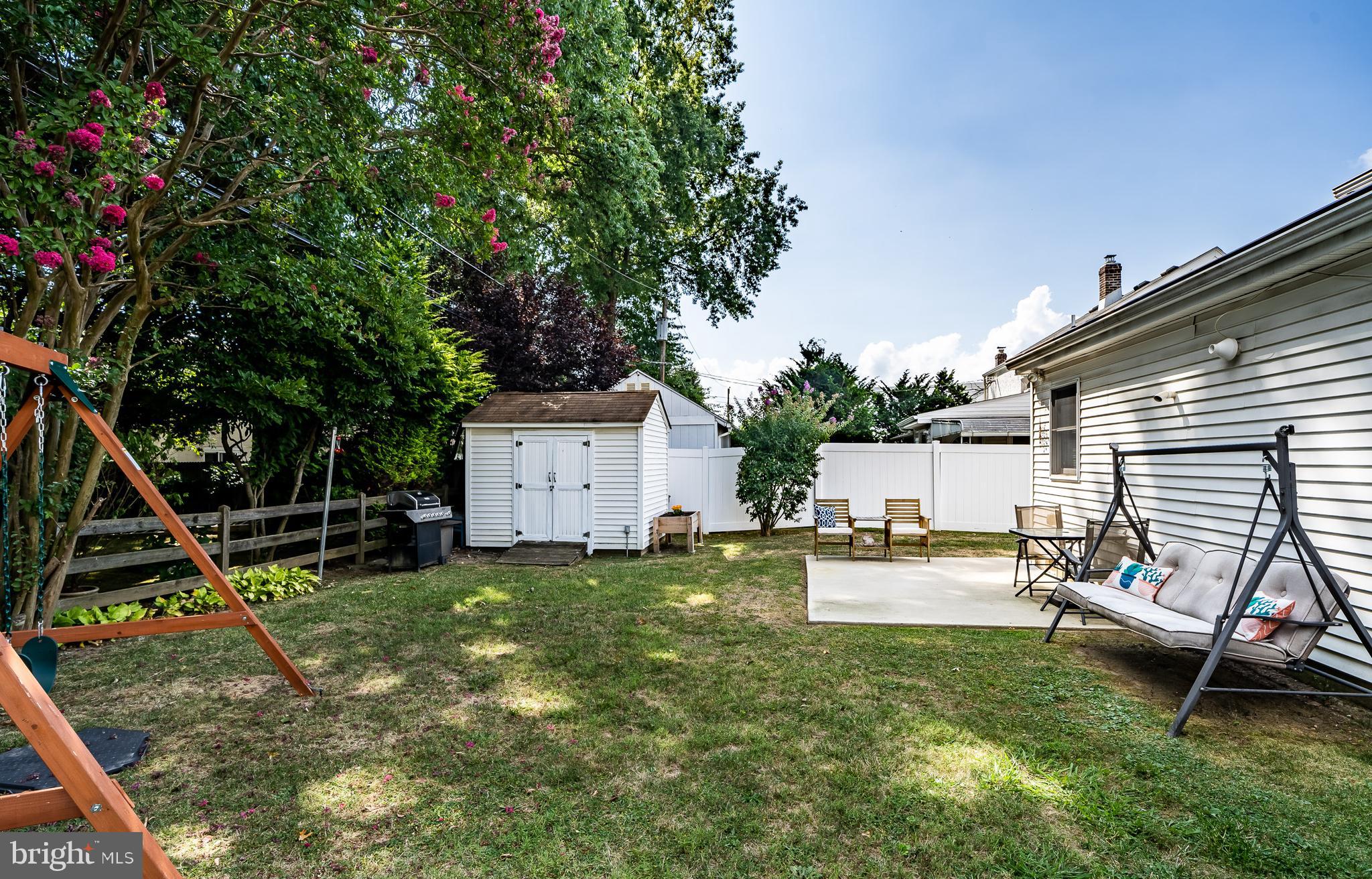 876 Cricket Road Secane, PA 19018 - Photo 35 of 37 Backyard view from left showing shed