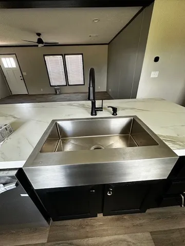 a close view of sink and stove
