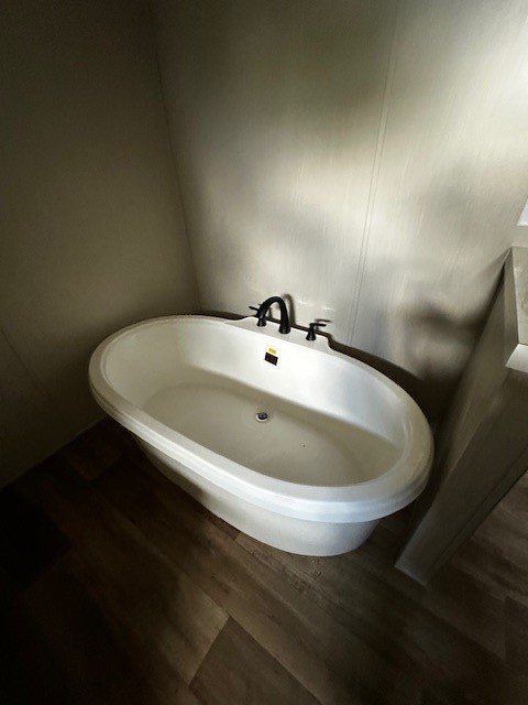 14318 Hughes Road Guy, TX 77444 - Photo 36 of 42 a bathroom with a bathtub