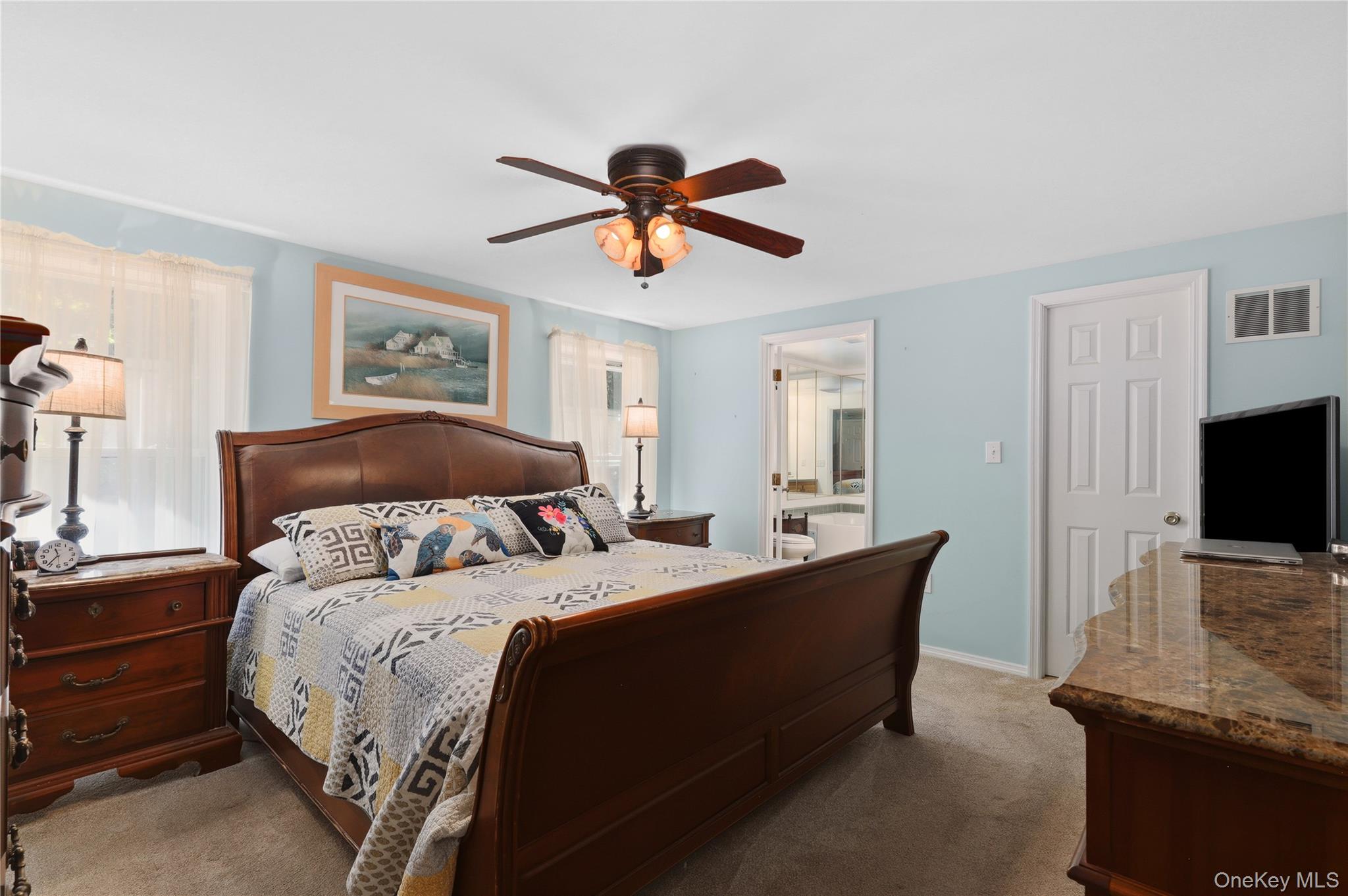 590 Farm To Market Road Brewster, NY 10509 - Photo 15 of 32 a bedroom with a bed and a flat screen tv
