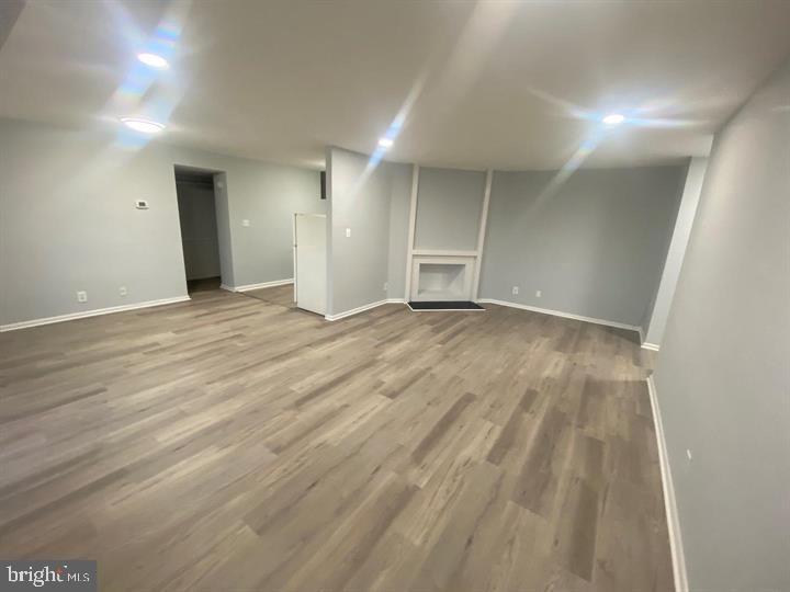5801 Quantrell Avenue, Unit L9 Alexandria, VA 22312 - Photo 3 of 11 a view of an empty room with wooden floor
