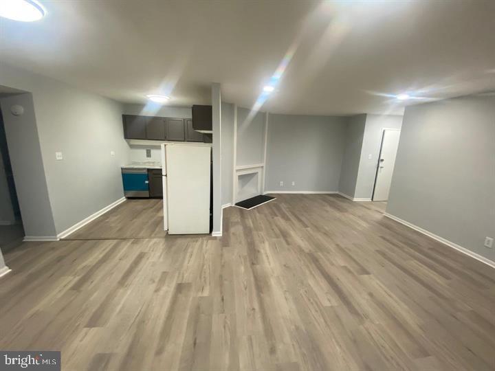 5801 Quantrell Avenue, Unit L9 Alexandria, VA 22312 - Photo 6 of 11 a view of a livingroom with a fireplace