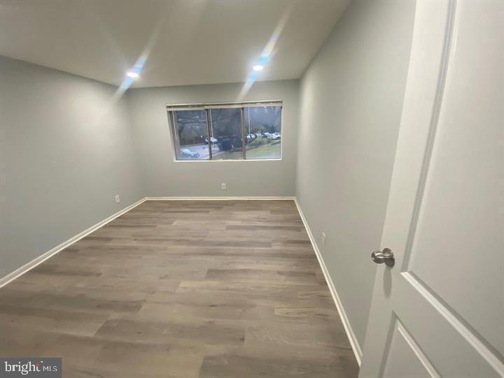 5801 Quantrell Avenue, Unit L9 Alexandria, VA 22312 - Photo 8 of 11 wooden floor in a gallery with wooden floor