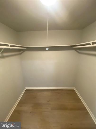 5801 Quantrell Avenue, Unit L9 Alexandria, VA 22312 - Photo 10 of 11 a view of a room with racks on the wall