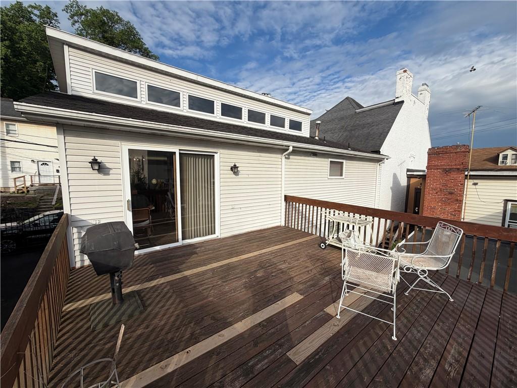 149 Chess Street Monongahela, PA 15063 - Photo 29 of 35 a front view of a house with wooden bench and chairs