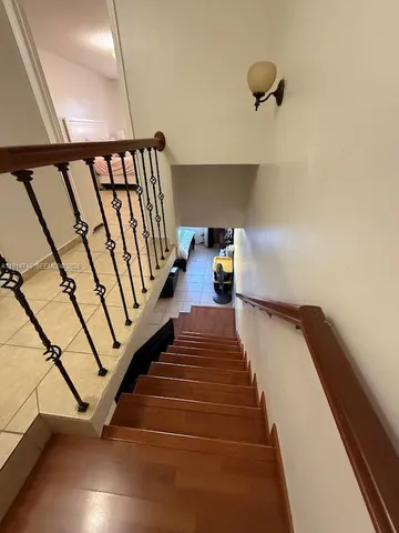 a view of hallway with stairs