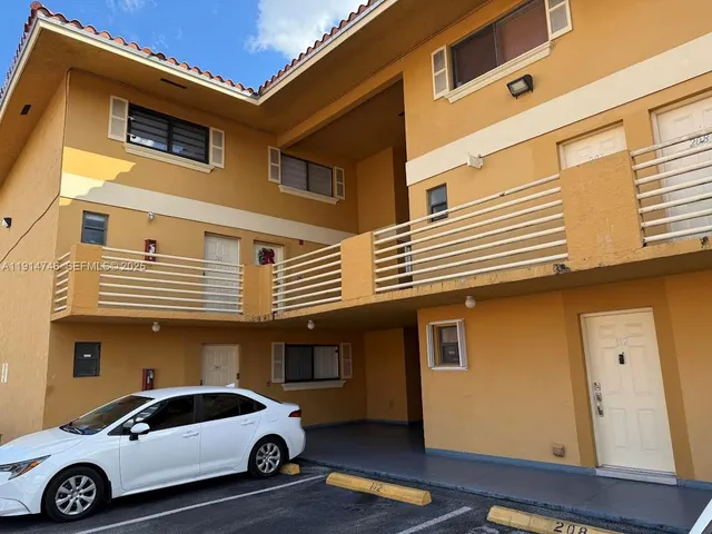 a car parked in front of a building