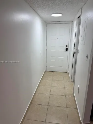 a view of hallway with shower