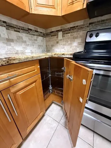 a view of staircase with white walls