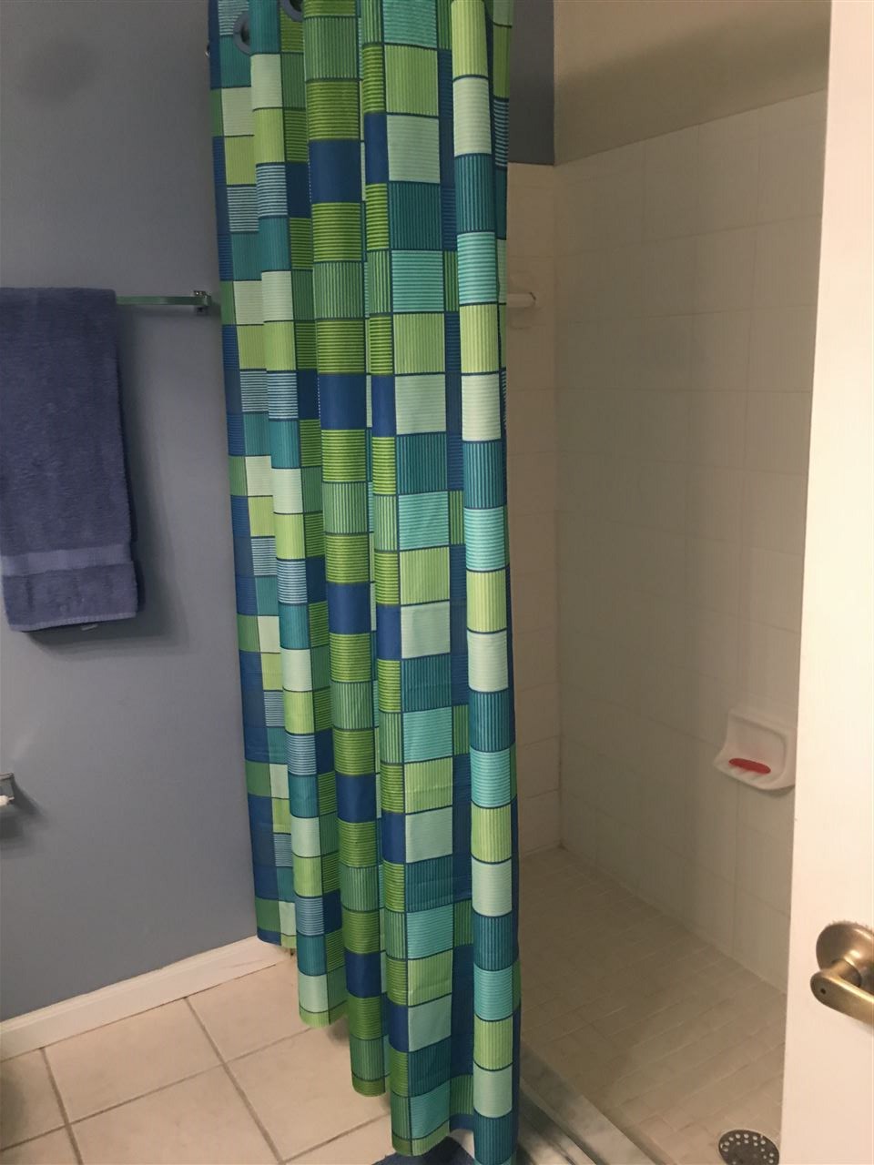 210 16th Street, Unit B St. Augustine, FL 32080 - Photo 10 of 12 a bathroom with a shower