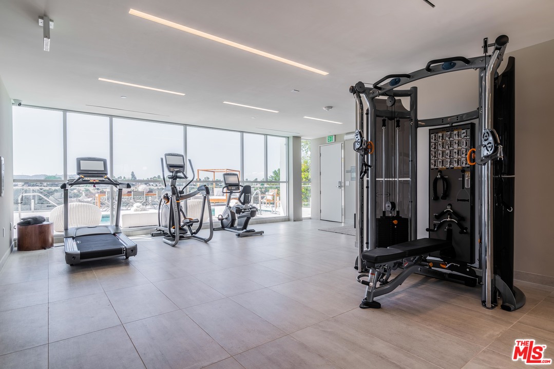 2391 Roscomare Road, Unit 103 Los Angeles, CA 90077 - Photo 22 of 32 a view of a room with gym equipment