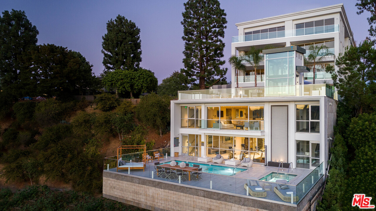 2391 Roscomare Road, Unit 103 Los Angeles, CA 90077 - Photo 31 of 32 a front view of a building with balcony