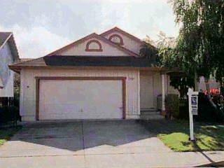7416 Maximillian Place Rohnert Park, CA 94928 - Photo 1 of 1 a front view of a house with garden