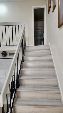 a kitchen with stainless steel appliances a refrigerator stove and sink