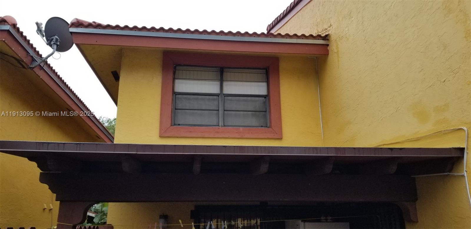 5975 Southwest 137th Avenue, Unit 803 Miami, FL 33183 - Photo 30 of 31 a view of wooden door