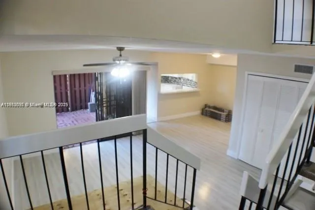 a view of hallway with livingroom