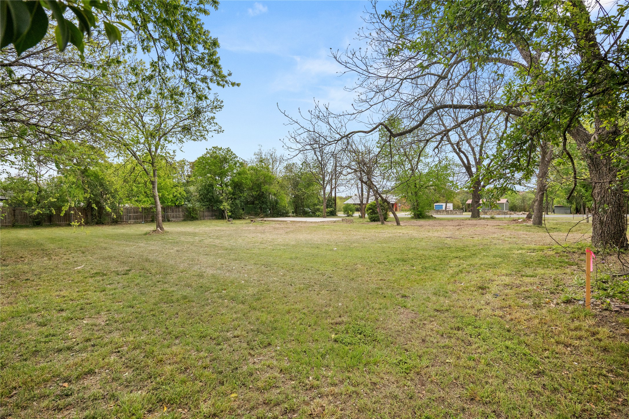601 North Church Street Georgetown, TX 78626 - Photo 1 of 16 a backyard of apartments with large trees
