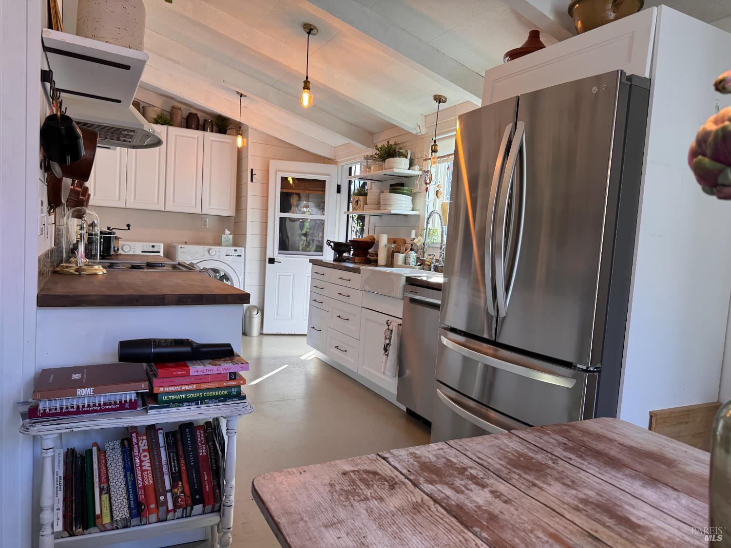 52 Oakstone Court, Unit 52 Santa Rosa, CA 95409 - Photo 11 of 49 a kitchen with stainless steel appliances granite countertop a refrigerator a stove and a sink