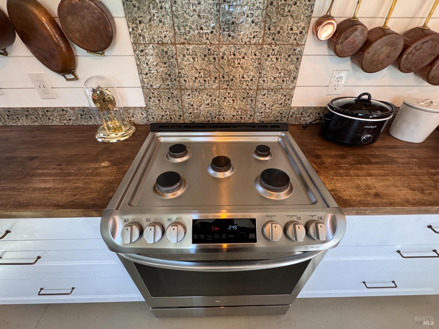 52 Oakstone Court, Unit 52 Santa Rosa, CA 95409 - Photo 15 of 49 a stove top oven sitting inside of a kitchen