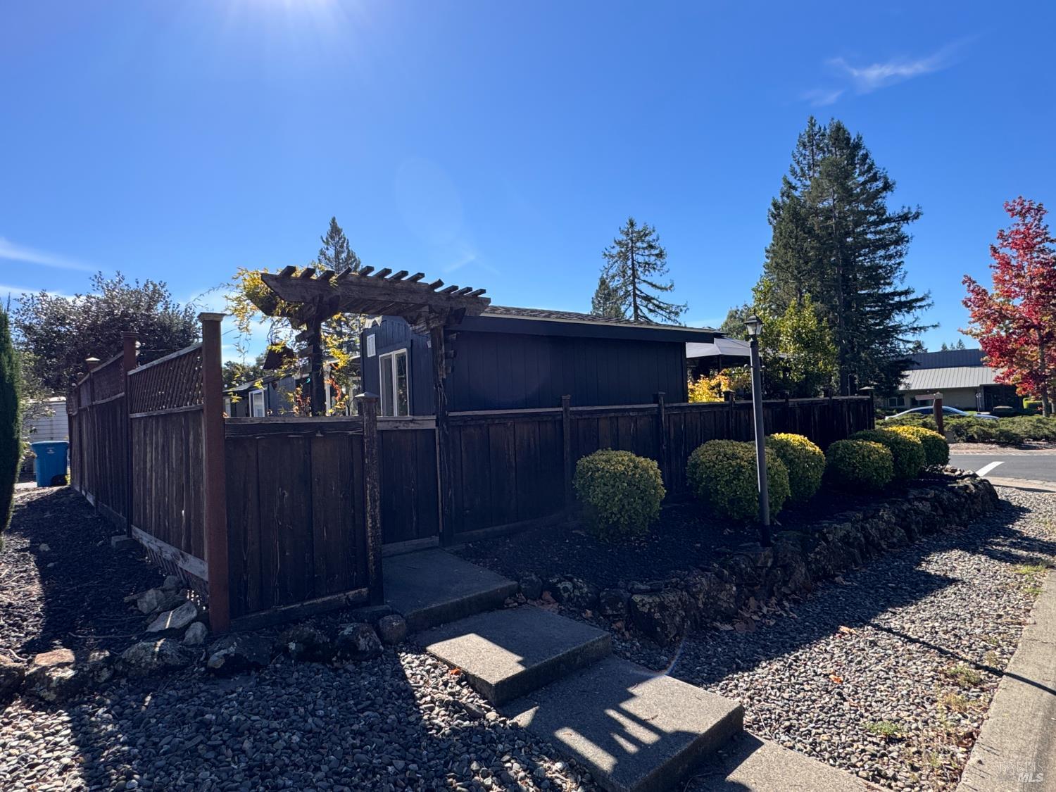 52 Oakstone Court, Unit 52 Santa Rosa, CA 95409 - Photo 2 of 49 a view of a porch with furniture and floor to ceiling window