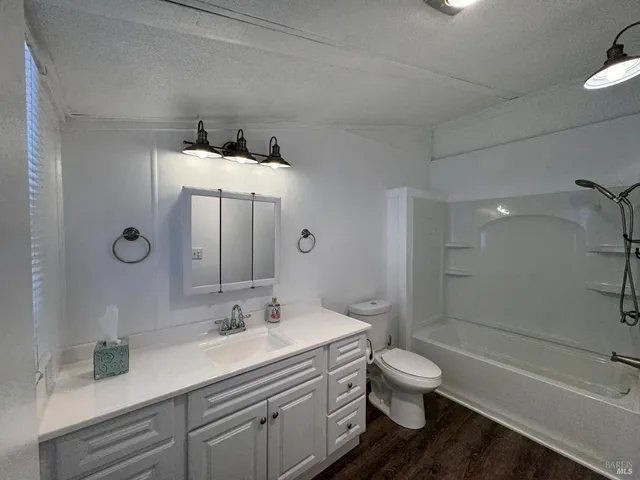 a view of a street with sitting area