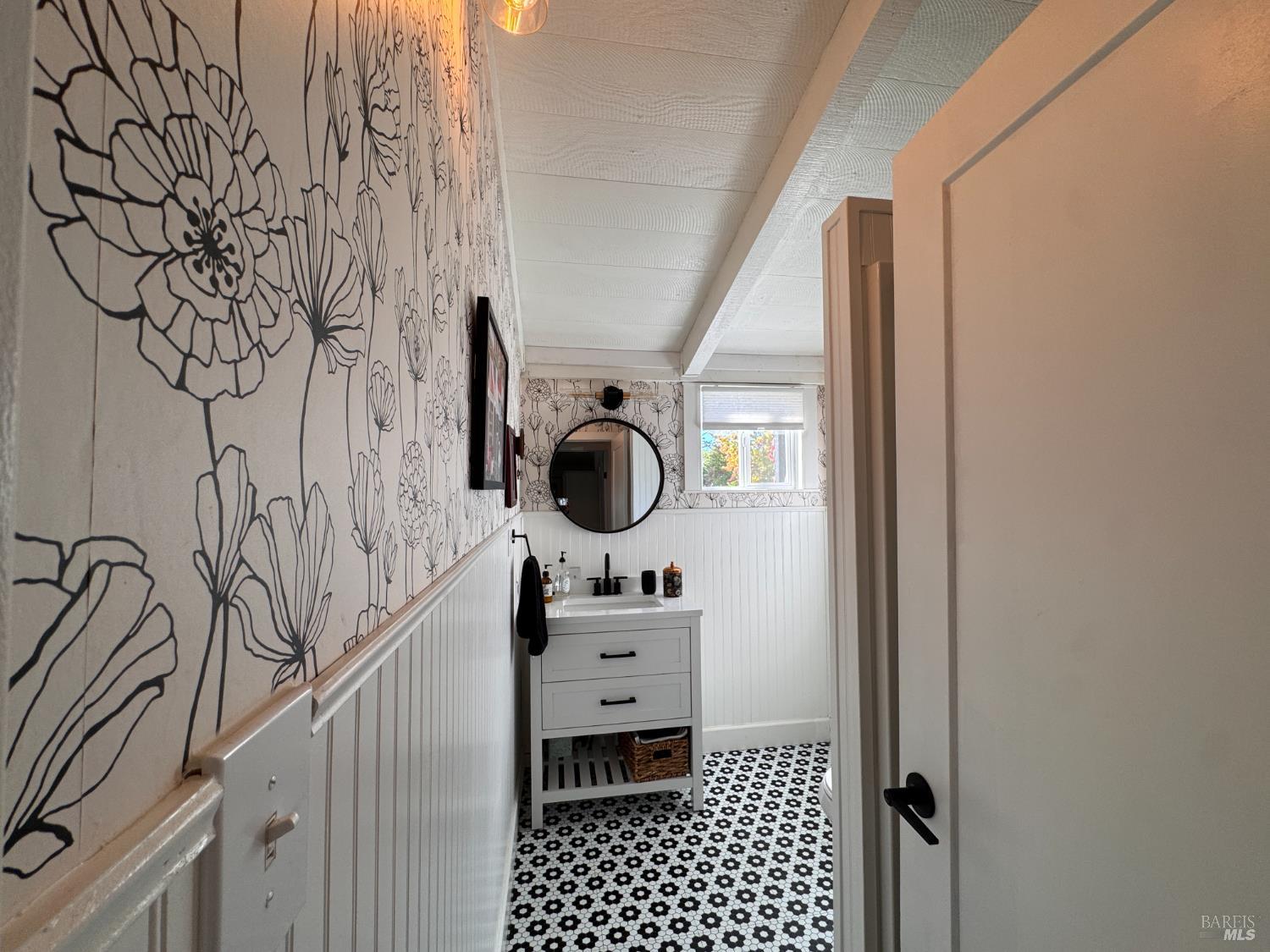 52 Oakstone Court, Unit 52 Santa Rosa, CA 95409 - Photo 25 of 49 a view of a hallway with wooden floor and a bathroom