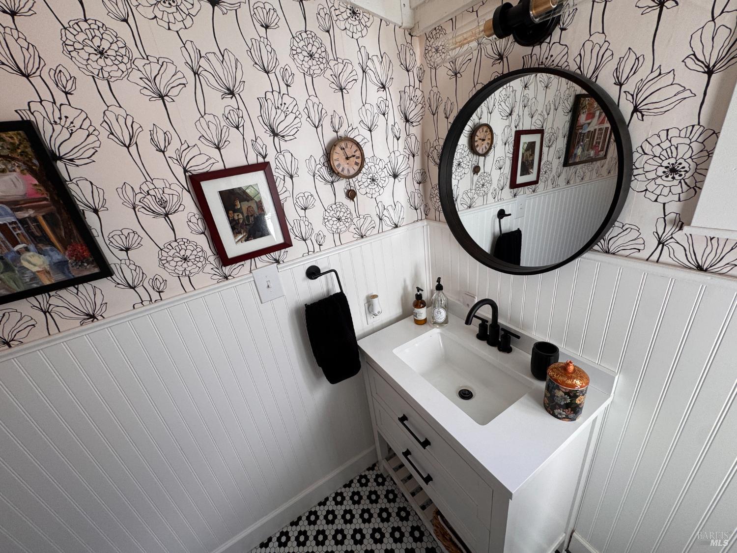 52 Oakstone Court, Unit 52 Santa Rosa, CA 95409 - Photo 26 of 49 a bathroom with a sink and a mirror