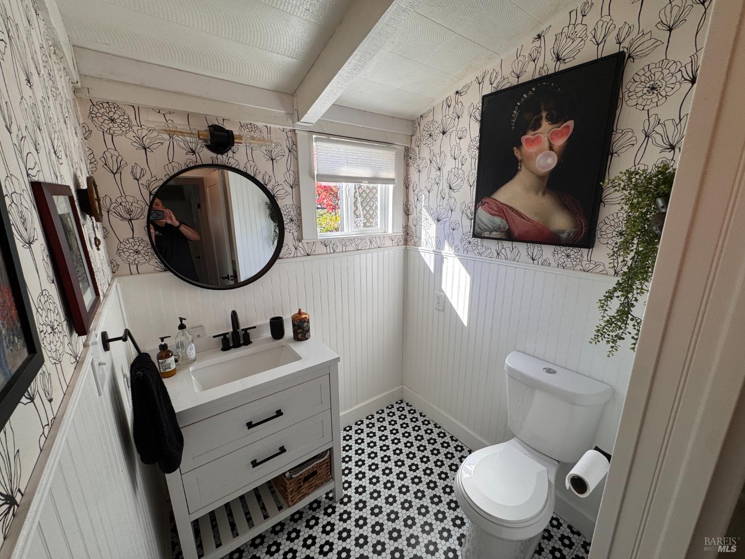 52 Oakstone Court, Unit 52 Santa Rosa, CA 95409 - Photo 27 of 49 a bathroom with a toilet sink and mirror