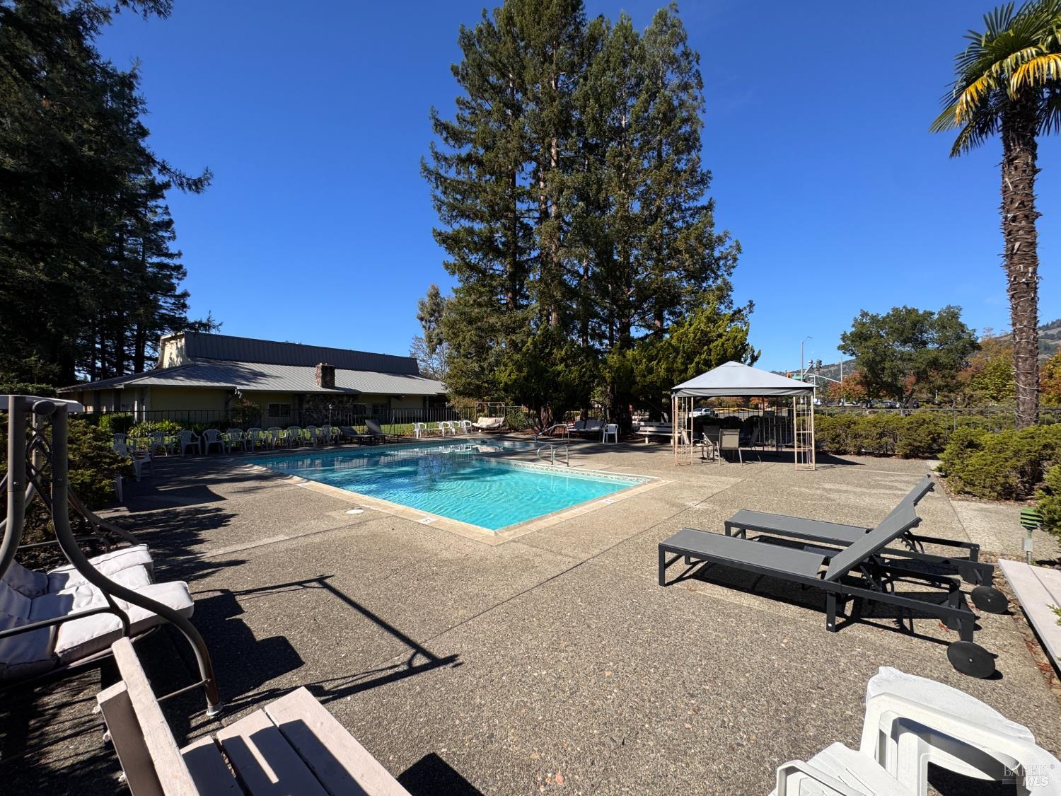 52 Oakstone Court, Unit 52 Santa Rosa, CA 95409 - Photo 45 of 49 a view of a backyard with sitting area