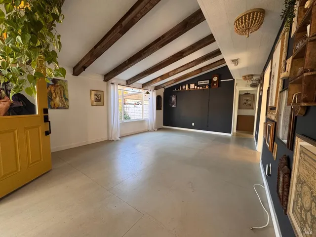 a kitchen with stove and cabinets