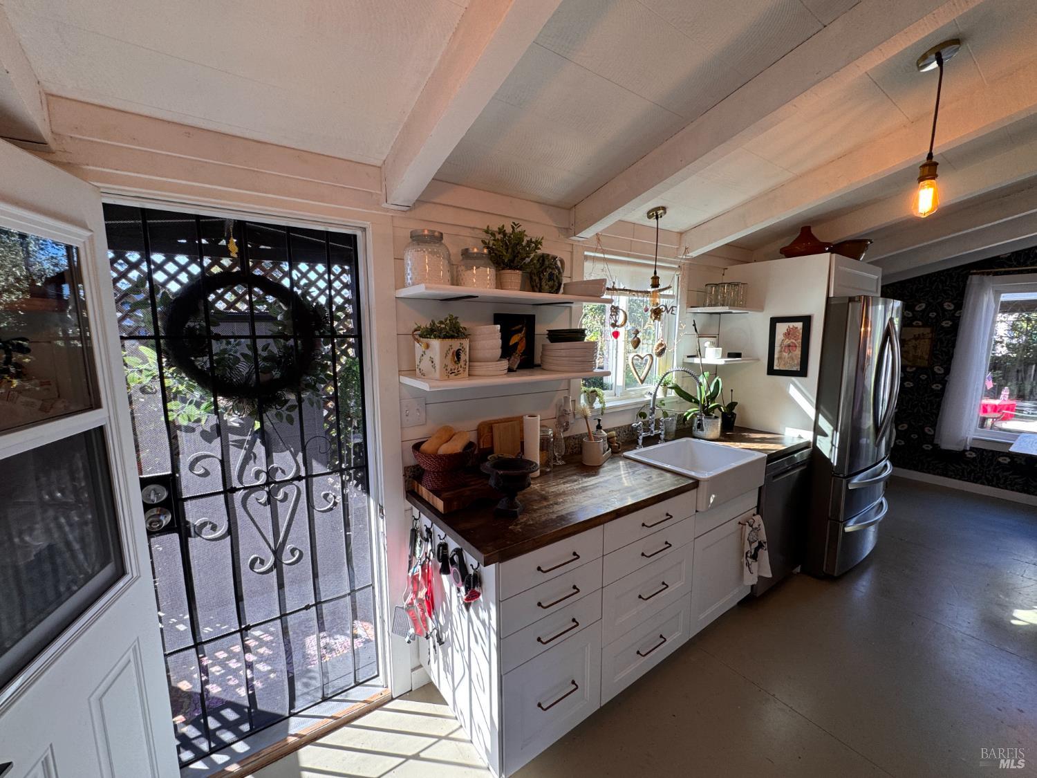 52 Oakstone Court, Unit 52 Santa Rosa, CA 95409 - Photo 8 of 49 a kitchen with stainless steel appliances granite countertop a stove a sink and a refrigerator