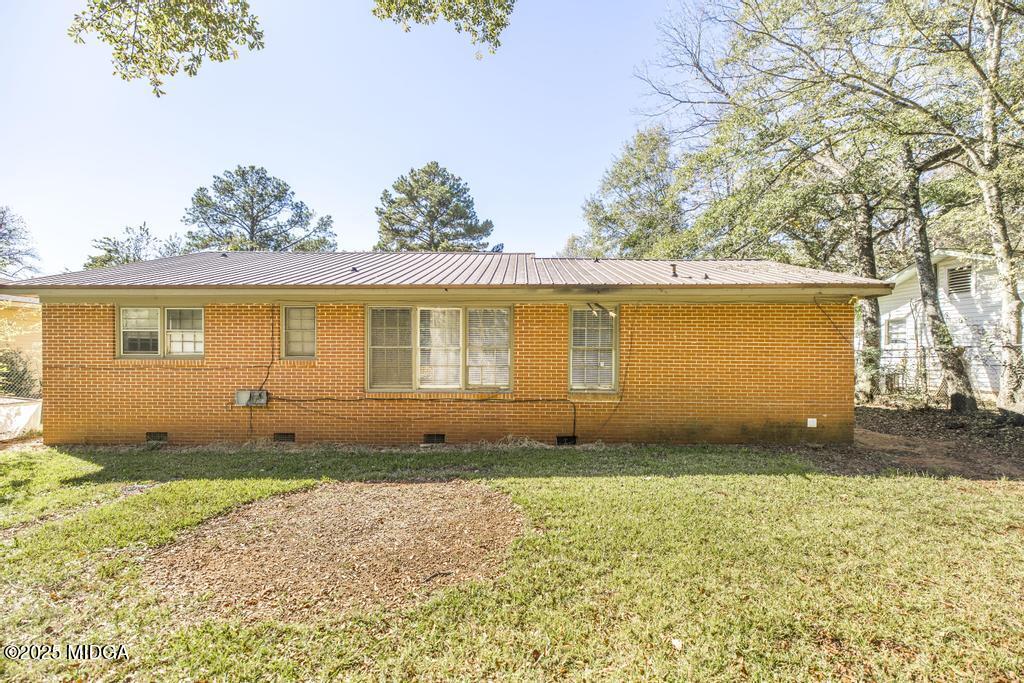 1940 Manson Road Macon, GA 31217 - Photo 27 of 28 front view of a house with a yard