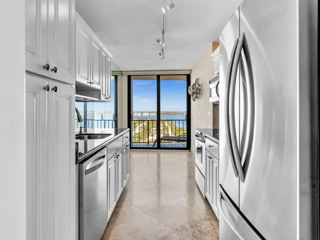 a bathroom with a shower a toilet and a bathtub