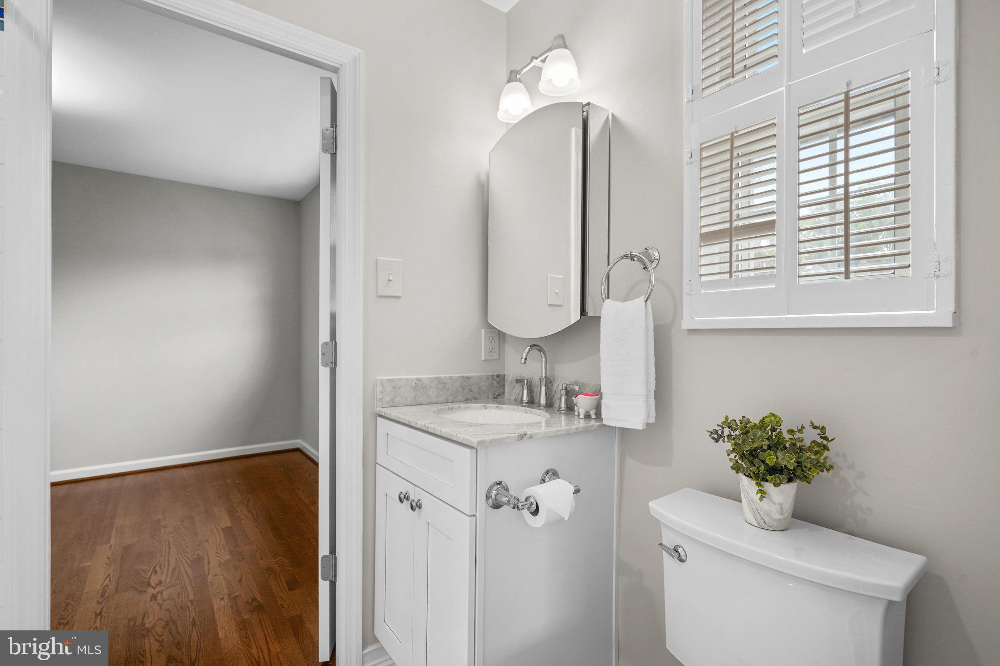 5005 Rodman Road Bethesda, MD 20816 - Photo 27 of 48 Remodeled Jack N' Jill Bathroom with upgraded tile