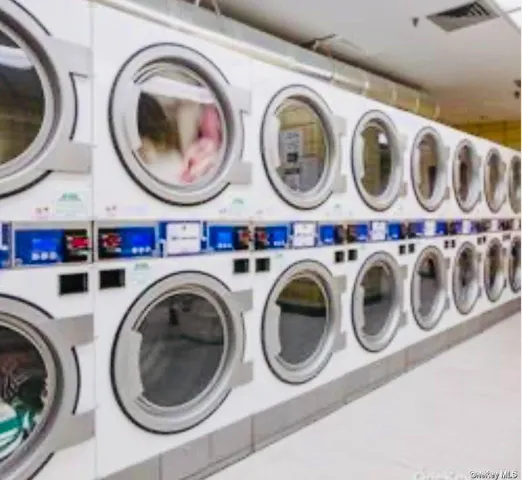 a view of washer and dryer in a utility room