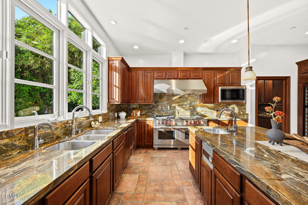 1533 Rancho Avenue Glendale, CA 91201 - Photo 4 of 8 a large kitchen with a large window and counter space