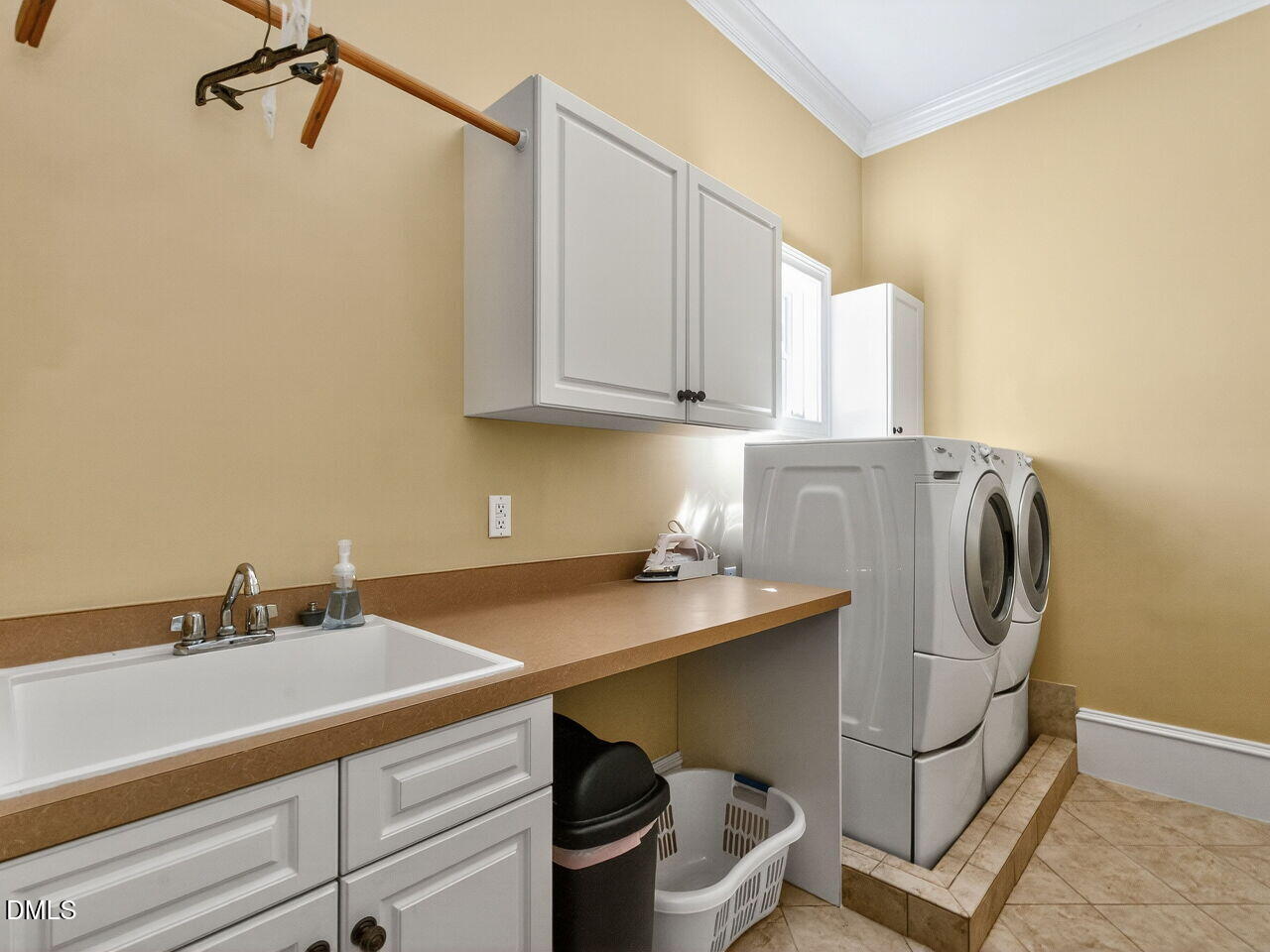 2644 Davis Street Raleigh, NC 27608 - Photo 16 of 30 a utility room with a sink washer and dryer