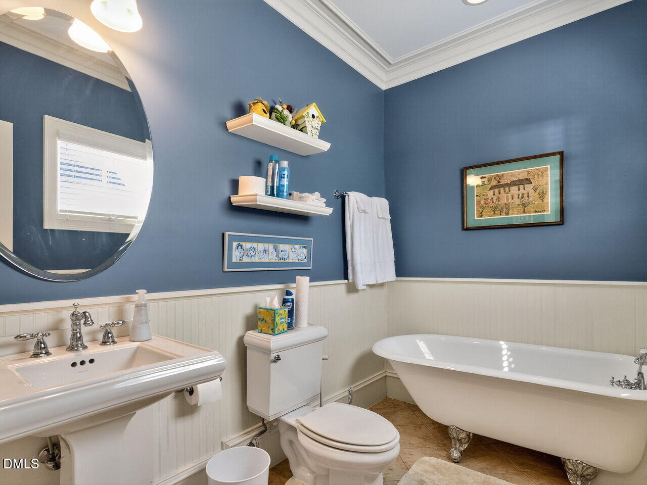 2644 Davis Street Raleigh, NC 27608 - Photo 22 of 30 a bathroom with a toilet a sink and a mirror
