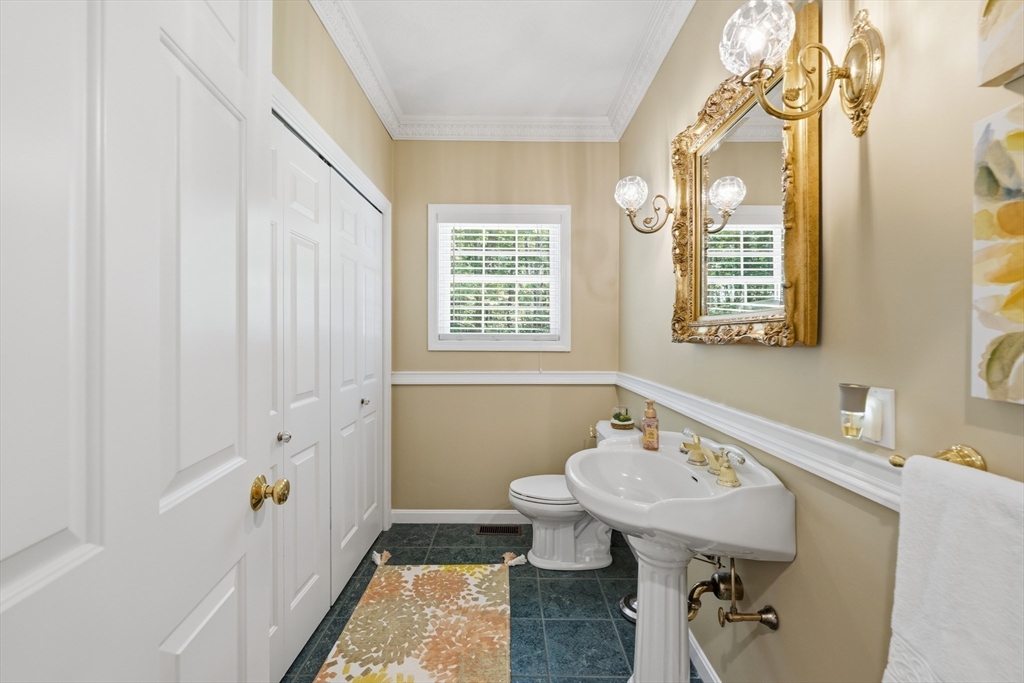 25 Haymeadow Road Boxford, MA 01921 - Photo 9 of 42 a bathroom with a sink toilet and shower