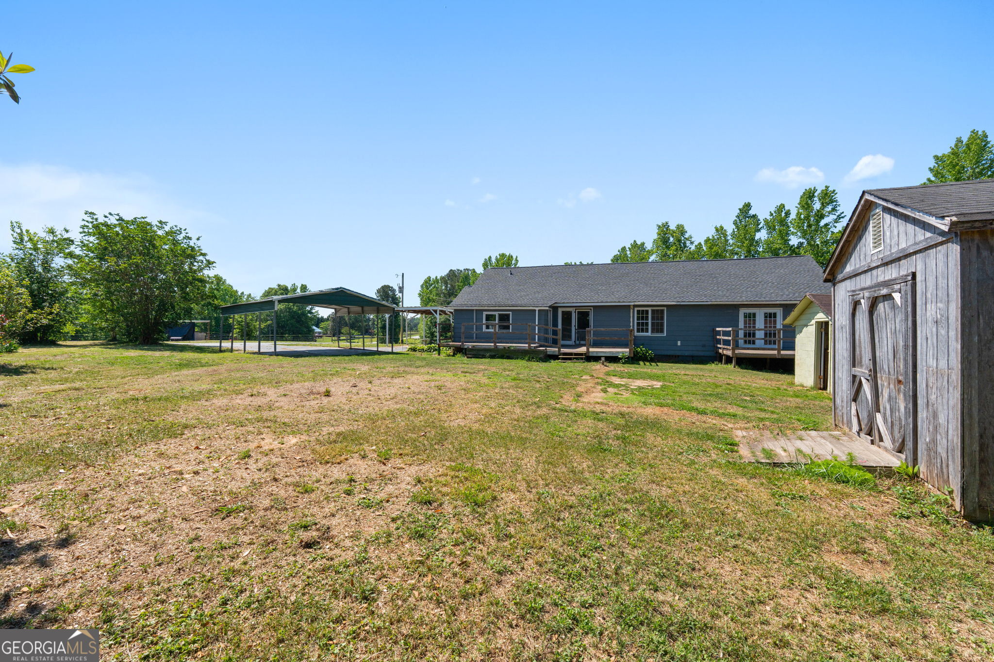 49 Frost Road Bowdon, GA 30108 - Photo 40 of 60 a front view of a house with a yard