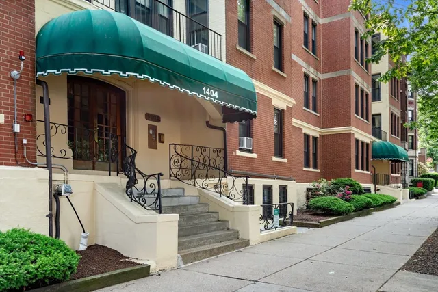 a view of a building with a park