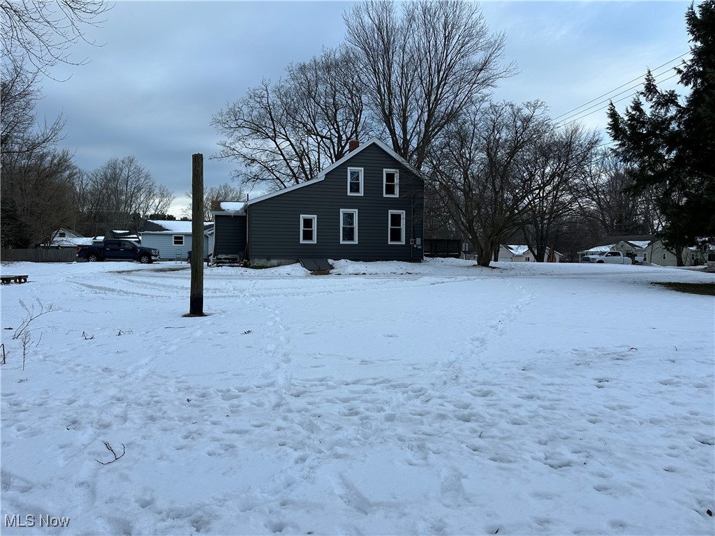 5258 Lockwood Road Madison, OH 44057 - Photo 37 of 39 Side of home and large lot
