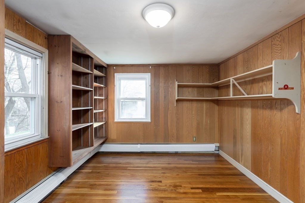 36 Intervale Road Worcester, MA 01602 - Photo 18 of 31 an empty room with wooden floor and windows