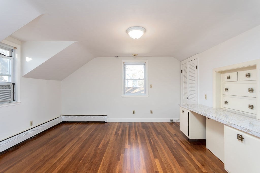 36 Intervale Road Worcester, MA 01602 - Photo 21 of 31 wooden floor in an empty room with a window