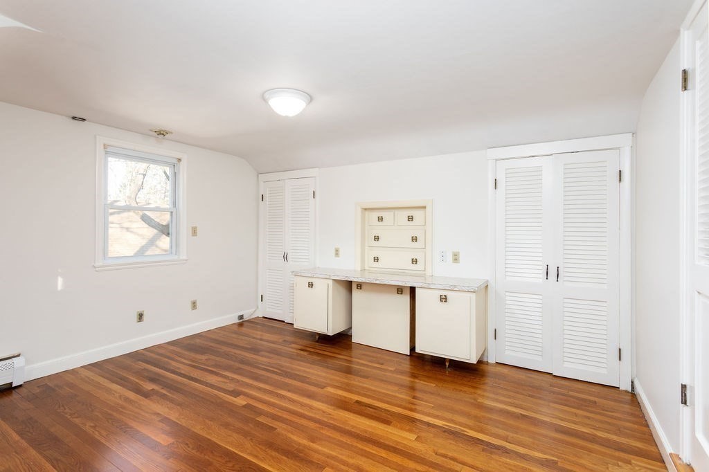 36 Intervale Road Worcester, MA 01602 - Photo 22 of 31 an empty room with wooden floor and window