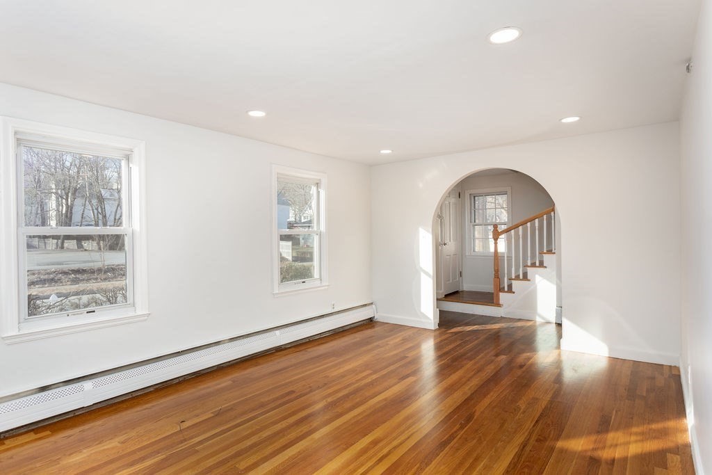 36 Intervale Road Worcester, MA 01602 - Photo 3 of 31 a view of an empty room with wooden floor and a window