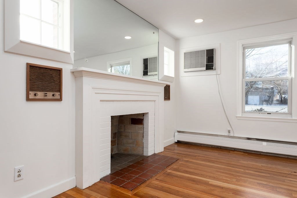 36 Intervale Road Worcester, MA 01602 - Photo 4 of 31 a view of a livingroom with an empty space and a fireplace